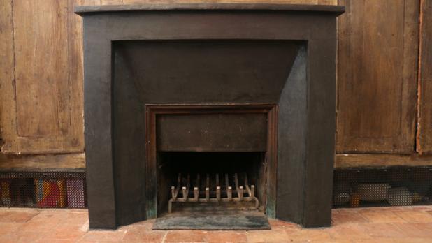 Cheminée rénovée grâce à l'enduit en béton ciré